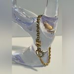 Gold over sterling silver Tennis bracelet with heart charm. Photo 3