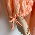 SOVERE Vive Cut Out Smock Dress Photo 5