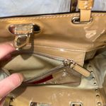 Valentino Garavani Rockstud Patent Leather Shoulder Bag In Tan Photo 5