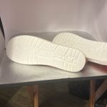 Red Santa sneakers. Their canvas size European 38,which converts to a size 7 1/2 Photo 4