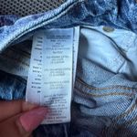 Good American sz 10/30 blue denim distressed jeans Photo 4