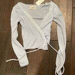 Urban Outfitters nwt  uo wrap tie lace trim long sleeve crop top xs blue Photo 0