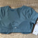 Alo Yoga  Airbrush Figure Short Sleeve Bra Top - Teal Agate Size Small Photo 0