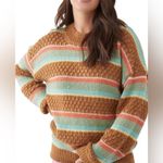 Hurley  ladies pullover cozy argyle crewneck sweater size medium Photo 1