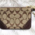 Coach 🔃 Signature Logo Brown Wristlet Photo 1