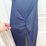 Like new navy workout jumpsuit romper with ruched butt and open back MEDIUM Blue Photo 2