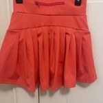 I’m not sure what brand but I think it is from target Orange Size XXS Photo 1