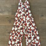Free People hot tropics front tie floral cropped jumpsuit Photo 6