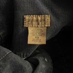 Chic Black Denim Skirt with Button Accents Size undefined Photo 2