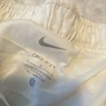 Nike  dri fit white and yellow shorts  Photo 4
