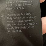 COS  black cotton spandex ruffle sleeve shirt size small Photo 5