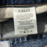 AGOLDE  distressed button fly denim mini skirt size 30 Photo 9