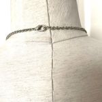 Long silver tone necklace with circles Photo 7