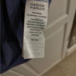 Tahari  lavender top. Size PS   25” long and 16. “ pit‎ to pit. Photo 4