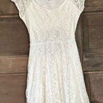 Delia*s lace bodycon mini dress with a‎ back cutout off white color Size medium Photo 0