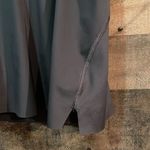 Athleta Ace Black Tennis Skort with silver reflective stripe on waistband Photo 1