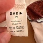 SheIn  NWOT Oversized White Long Sleeve Top with Football Print Photo 3