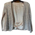 Women’s boutique sequin over shoulder cardigan size small de lovest Silver Photo 0