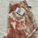 Nike (NWT) Loose Fit Tie Dye Cuffed Sweatpants in Dusty Orange, Medium Photo 6