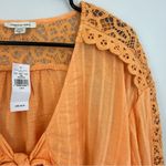 American Eagle NWT  Sherbet Orange Crochet Cropped Ruffle Tie Blouse Size Small Photo 3