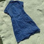 Denim blue floral dress
Fits like a women’s small S Photo 2