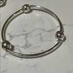 Silver Bracelets with Silver Beads and Elastic Bands Photo 5