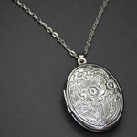 Flower Engraved Oval Locket Necklace Silver Photo 0
