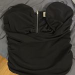 Blue Buttercup Black Top Photo 0