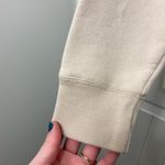 Hollister EUC ‎ Co women’s tan cream stitch decal pullover fleece lined hoodie M Photo 1