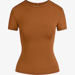 SKIMS  burnt orange shirt Photo 0