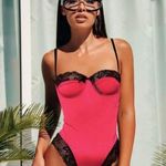 Elegant Pink and Black Lace Bodysuit Size L Photo 0