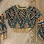 En Crême Sweater Photo 1