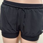 Nike  Women’s 2-in-1 Running Shorts size MEDIUM drawstring & pockets Photo 1