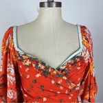 Free People  Mirabella Floral Wrap Front Blouse Photo 4