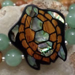 LEE SANDS Brown Photo 0