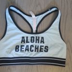 PINK - Victoria's Secret  aloha beaches sports bra pink nation pink crop in blue, black and white size medium. Photo 0