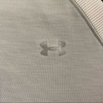 Under Armour  Heat Gear Long Sleeve Base Layer. Size Small. Photo 1