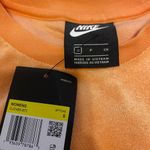 Nike vintage look sweater top. In color orange. Super cozy. Photo 2