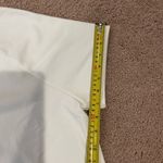 Under Armour Women's white loose baggy short sleeve too Photo 6