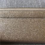 Kate Spade Full Size Gold Glitter Zippered Wallet. Photo 8