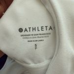 Athleta  Conscious Cut Out Crop Top Crossover Sports Bra D-DD Cups in White Photo 4