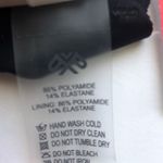 PilyQ NWT  Aralia Reversible Seamless Wave Teeny Bikini Photo 8