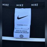 Nike  Women's Black Long Sleeve Top Photo 1