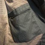 Patagonia  women’s rain jacket size M black hooded Photo 6