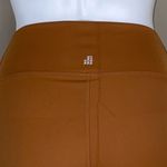 We Wore What ‎ Nylon Biker Short in Gold Photo 9