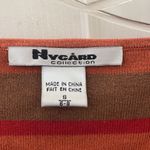 Peter Nygard FINAL MARKDOWN Nygard collection top small Photo 1