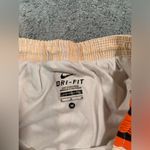 Nike medium orange striped shorts Photo 4