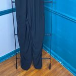 Newbury Kustom Newburyport Custom sm black v neck jumpsuit ruched sides of legs. Lace trim Photo 6
