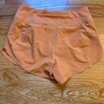 Athleta  orange shorts size XS Photo 2