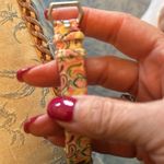 Fitbit barely used. As is. No idea what model. Cute band purchased separately Photo 3